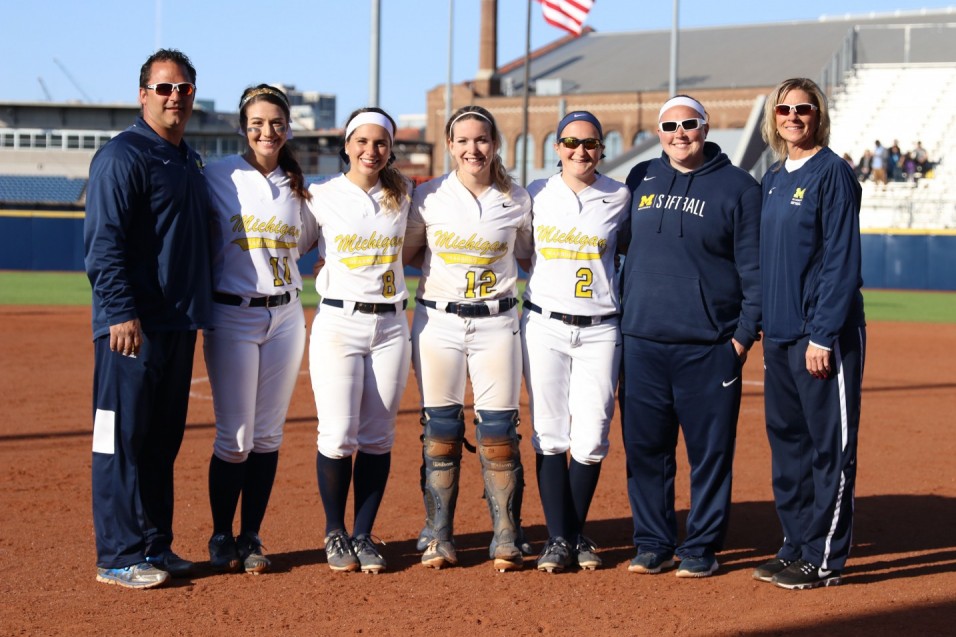 Wolverines split with Cardinals on Senior Day