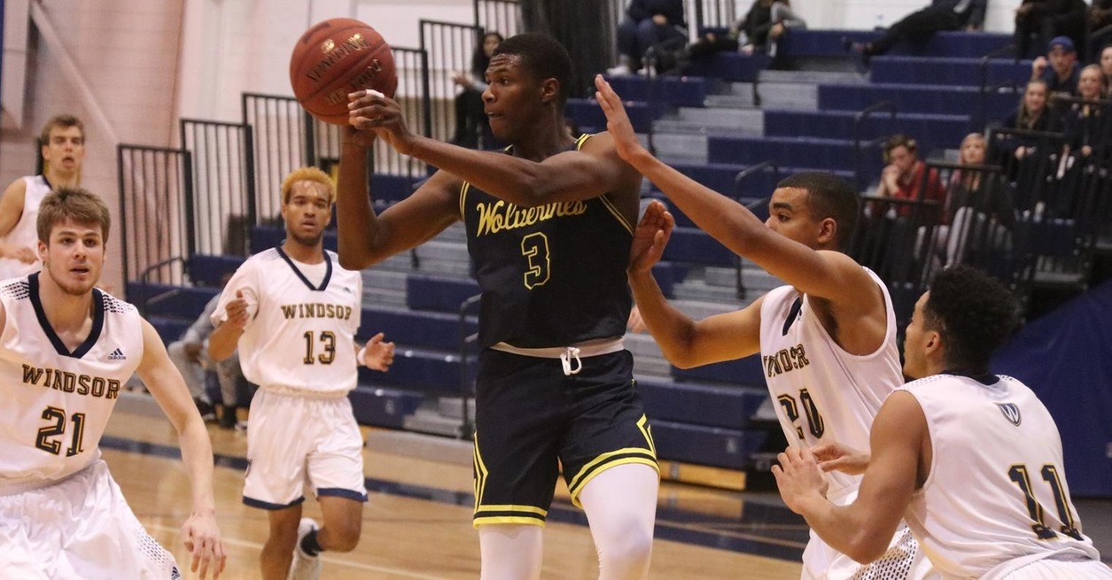 WOLVERINES FALL TO LANCERS 73-63