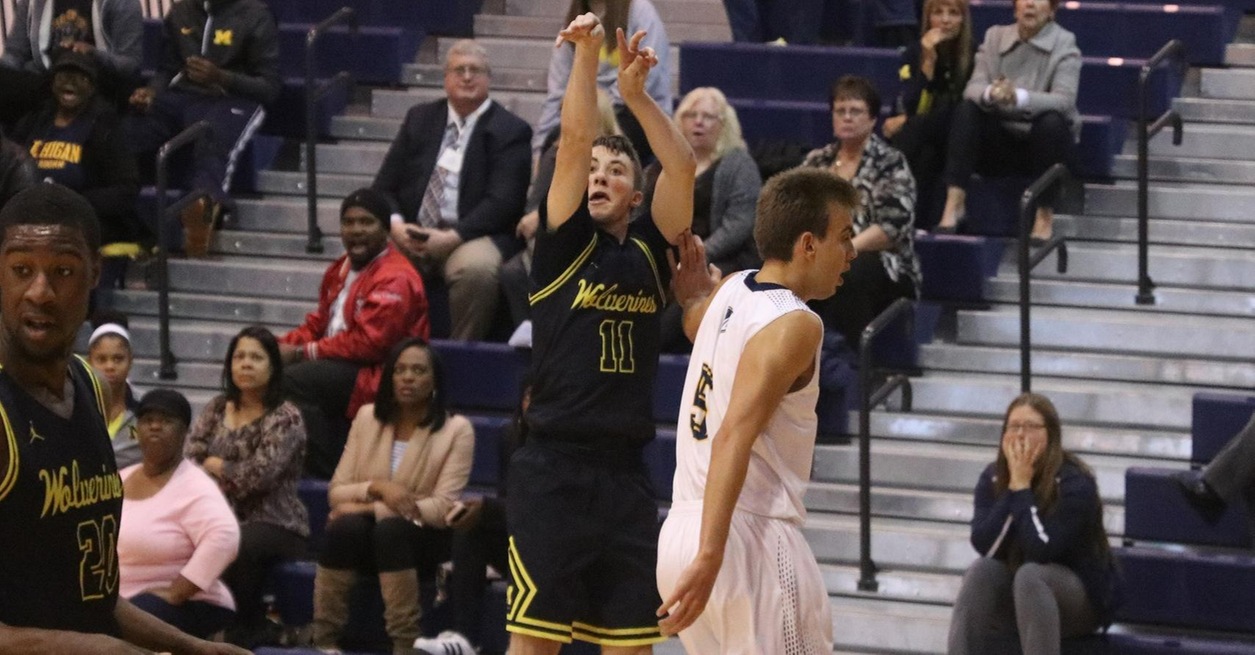WOLVERINES KNOCK OFF NO. 21 WARRIORS IN WHAC OPENER