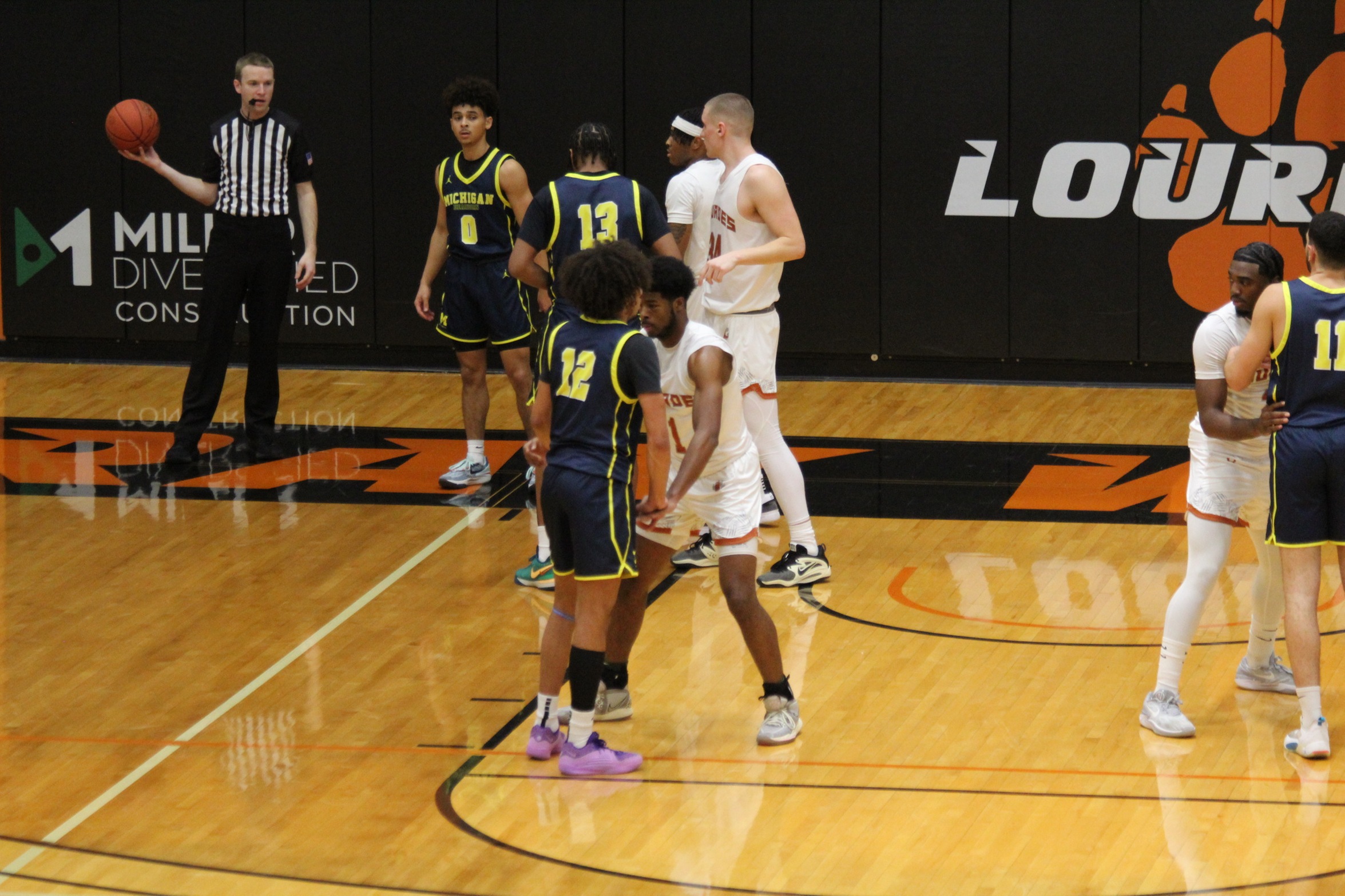 Mohamed and Leamy Lead Wolverines with 19 Points Against No. 10 Lourdes
