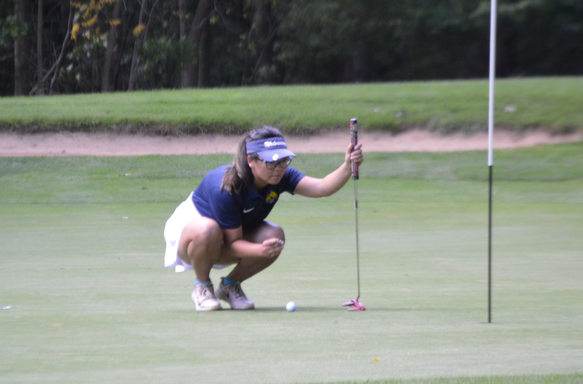 Sofia Cueva lines up a putt Wednesday en route to finishing first at the Aquinas Fall Invitational.