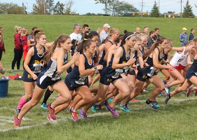 The Wolverines' top three finishers crossed the line within 40 seconds of one another.
