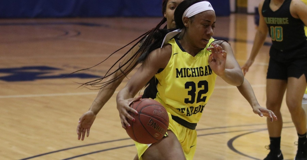 Wolverines pull away for 72-56 win over Bulldogs