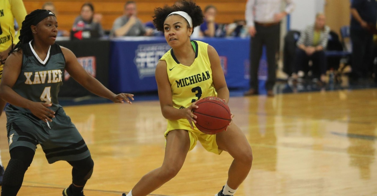 Wolverines pull away late for 84-68 win