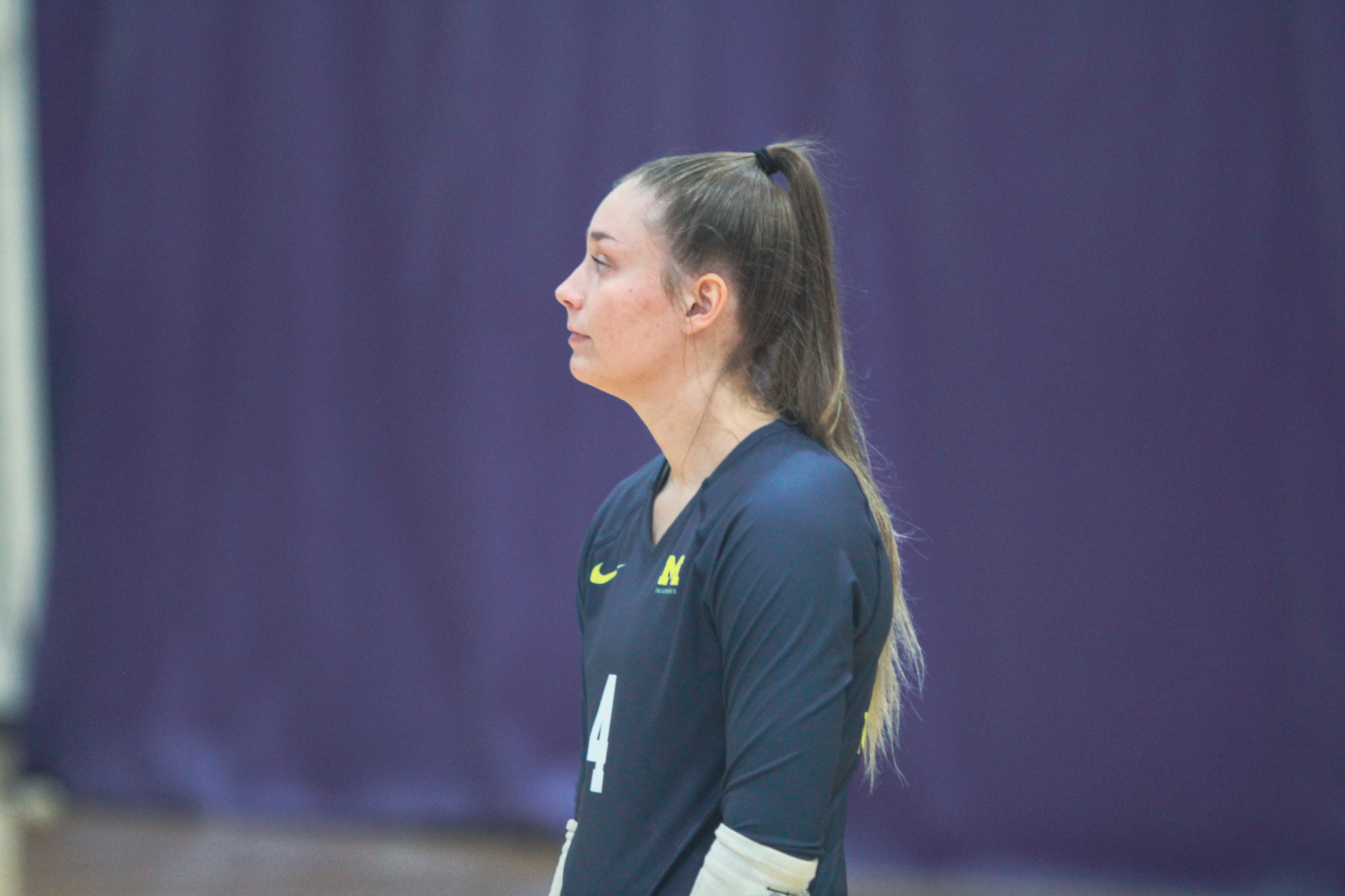 Wolverines Lose in Straight Sets to Nationally Ranked Aquinas